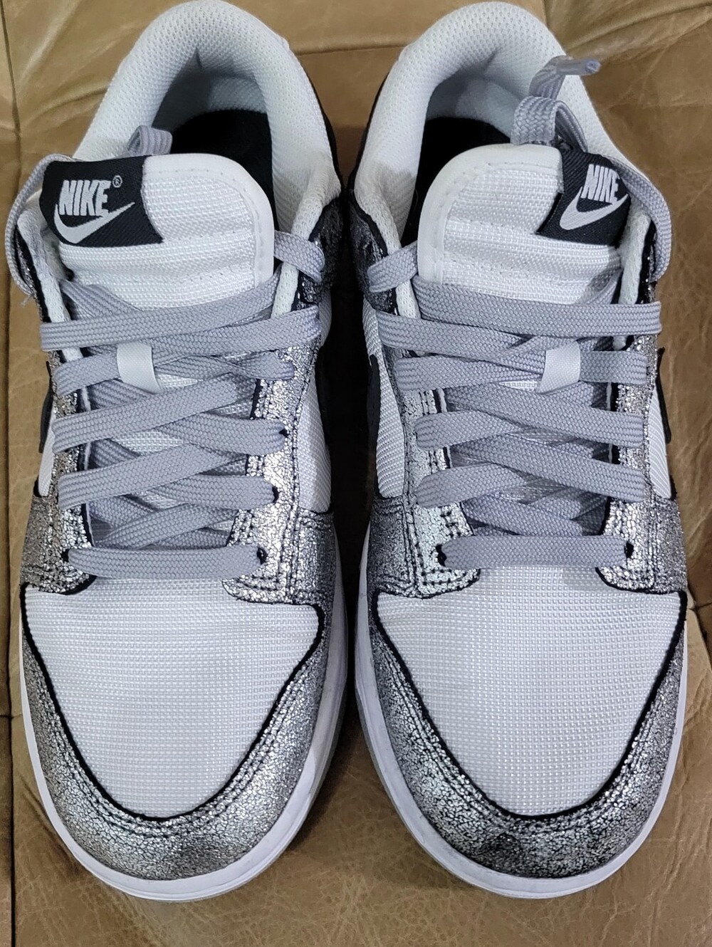 Nike Dunk Low Women's White Sneakers with Metallic Silver